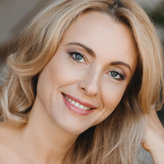 Woman with blond hair close up