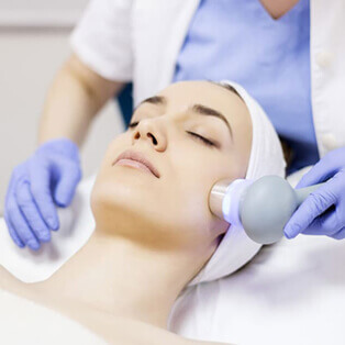 Woman getting laser rejuvenatin treatment